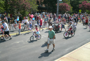 parade of people walking and bicycles