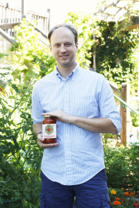 Neal holding a jar of Nellino's