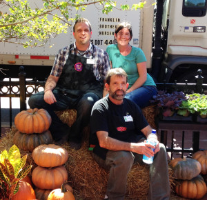 people posed on bales