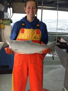 fisher woman holding fish