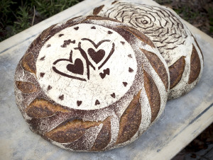 bread with hearts stenciled on