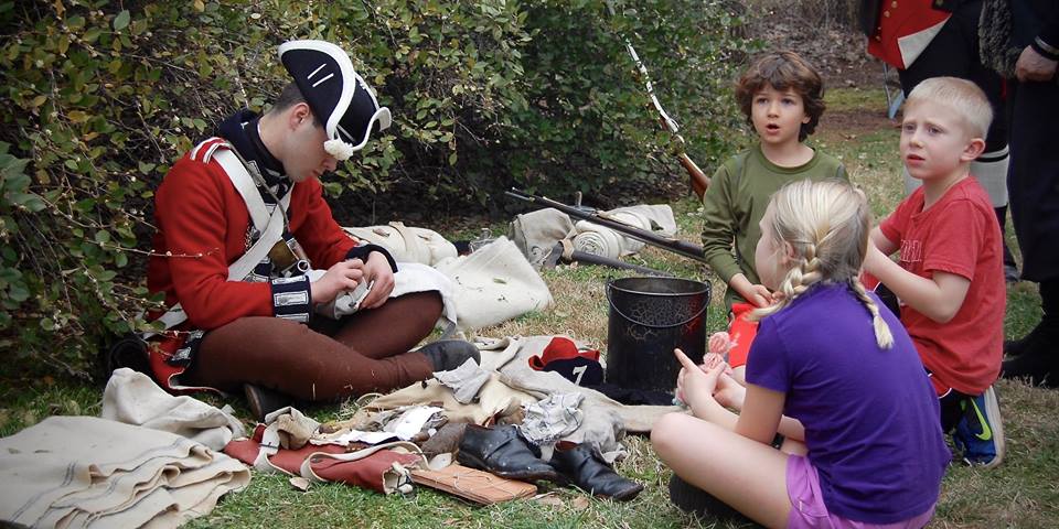 British soldier and children