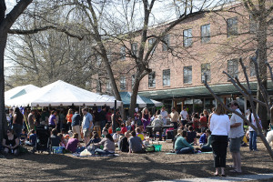 lawn at Carrboro store with tent of people