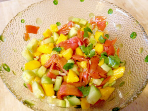 mango and smoked salmon salad in bowl