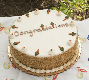carrot cake with congratulations written on it
