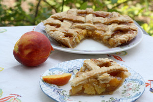 peach pie with a slice cut out