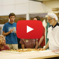 sampling bread in the bakery with video icon