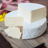 wedge of cheese on table