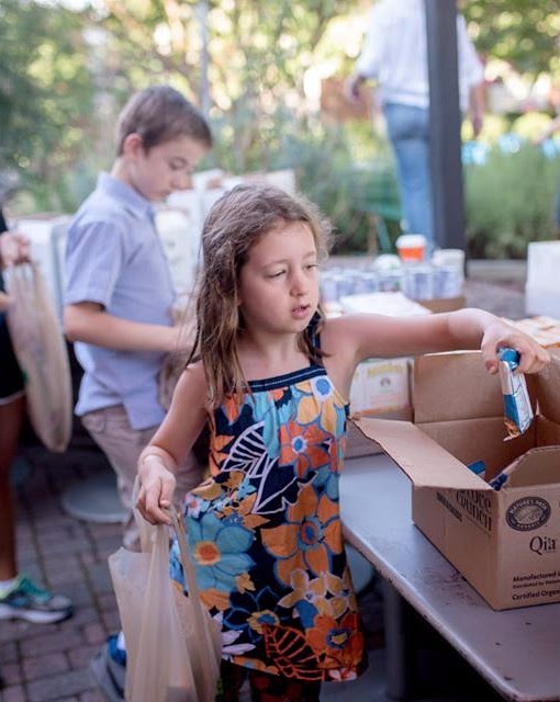 children helping sort food for TABLE