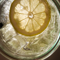 lemon slice floating in a drink