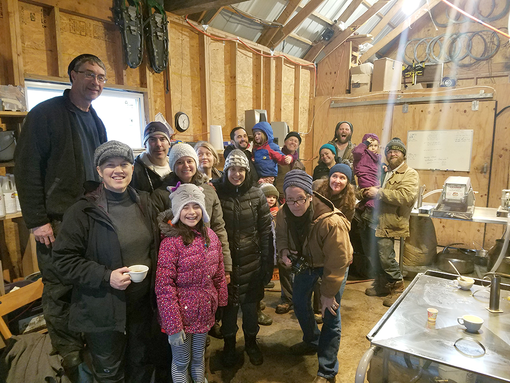 group of people in the sugar shack