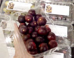 purple muscadines in box