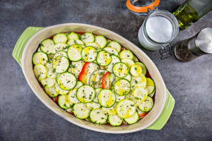 vegetables layered in baking dish