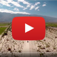 mountains and vineyards with video icon