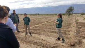 class having lesson in field