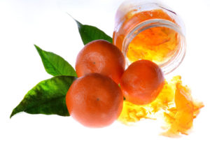 clementines with a jar or orange preserves
