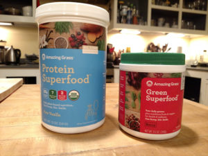 caisters of Amazin Grass powder