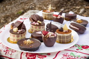 several pastries with hearts on a platter