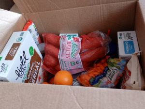 produce in a cardboard box
