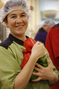 Carolyn holding peppers