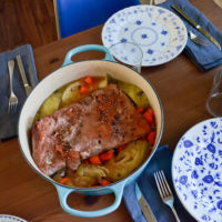 corned beef in pot on dinner table