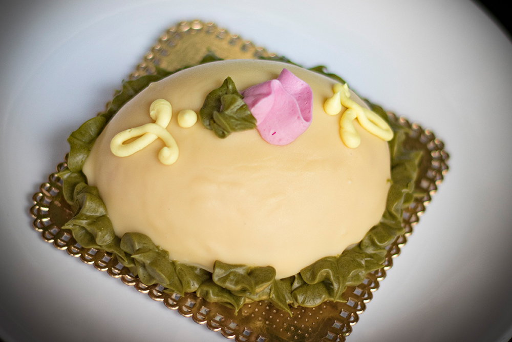 decorated egg-shaped pastry on a plate