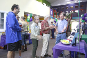 visitors try deviled eggs