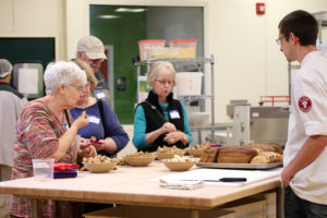 visitors taste bread