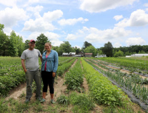 Keith and Megan posing in the field