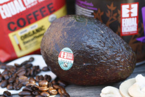 avocado, coffee beans, and packages, all with fair trade labels