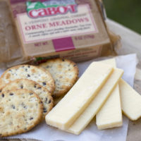 cheese slices and crackers with Cabot package of cheese