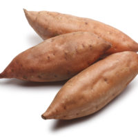 three nicely shaped sweet potatoes with pointy ends