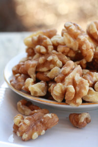 dish of walnuts on a table