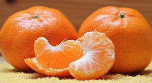 peeled and whole mandarins