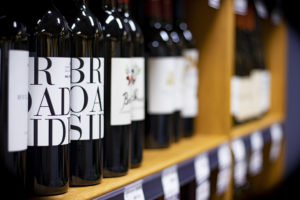 wine bottles on a shelf in our store