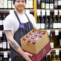Will holding a box of wine in our store's wine department