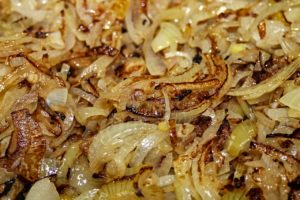 a mass of frying onions
