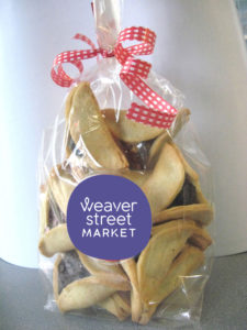 decorative bag filled with hamantaschen cookies