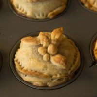 small pies with flaky crusts, with decorative crust on top