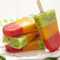 frozen pops with three layers of different kinds of fruit