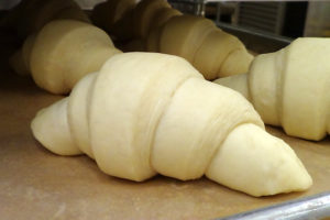 uncooked croissant on pan