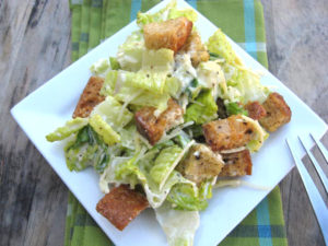 caesar salad on square plate